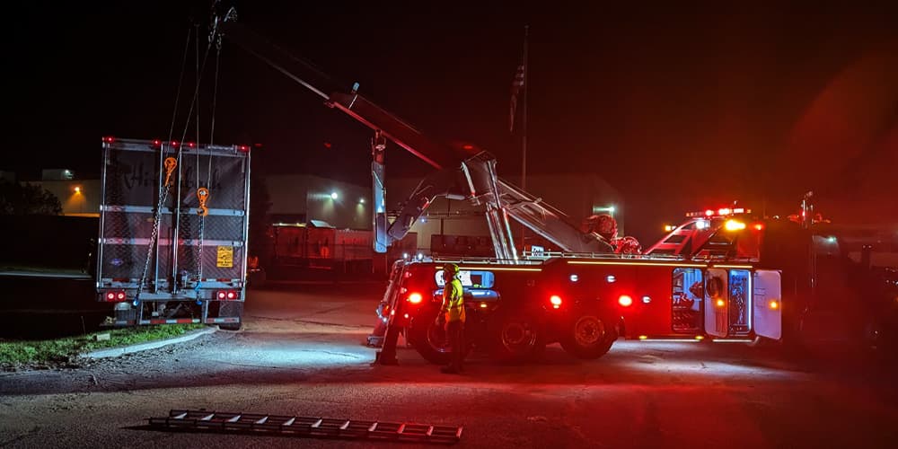 Image of Towing Truck at night in action