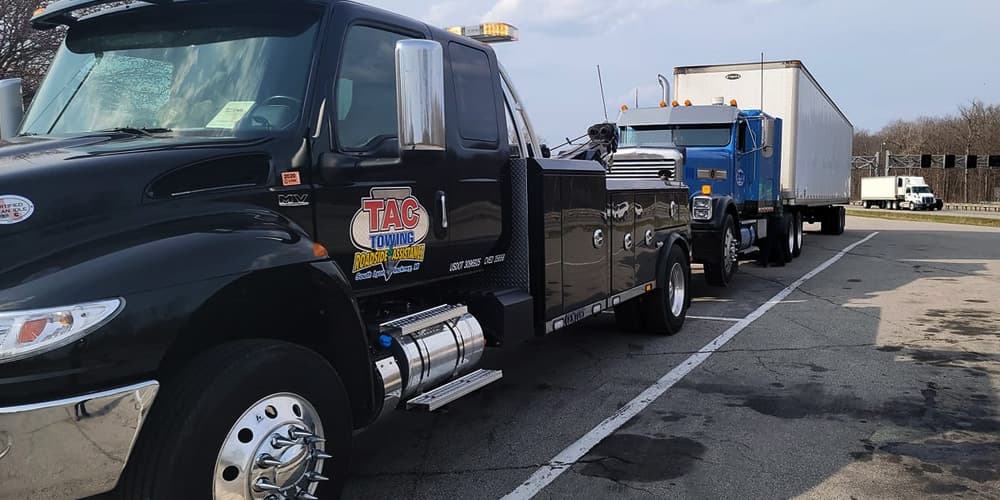 Image of Big Towing Truck towing a Truck